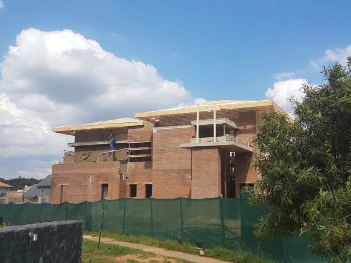New roof with timber trusses being installed